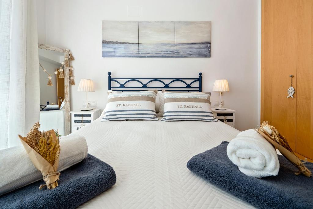 Postel nebo postele na pokoji v ubytování 1ª LÍNEA DE PLAYA. Apartamento: LA CALMA