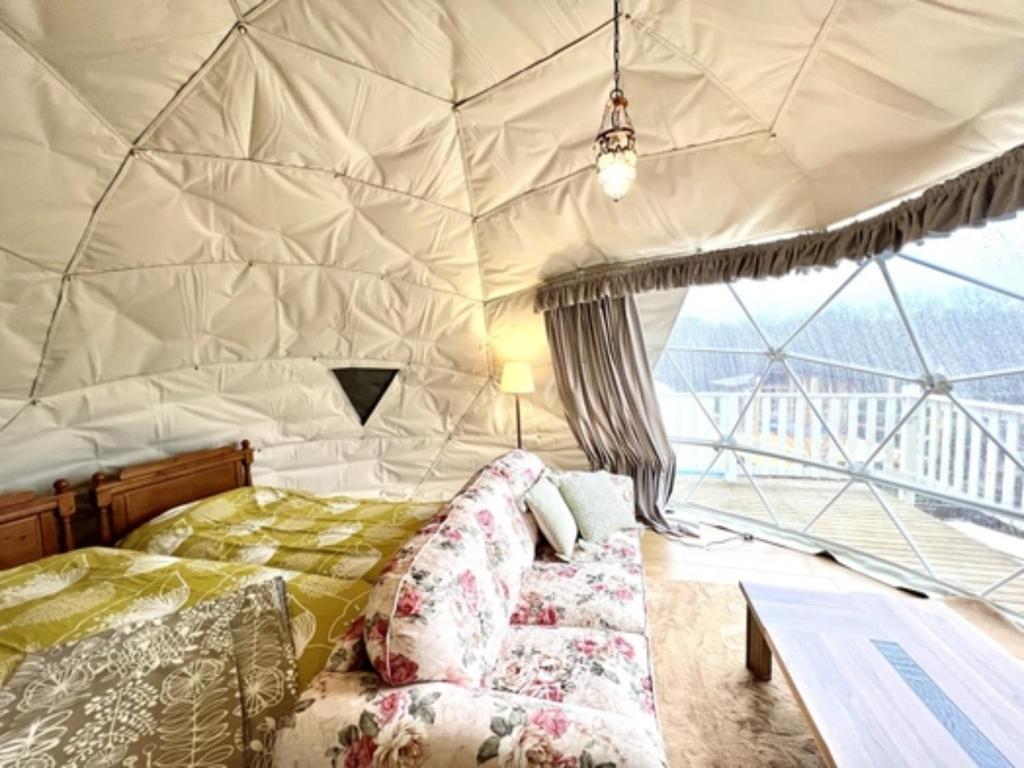 Katil atau katil-katil dalam bilik di Kogen no Kashi Besso Kurumi Terrace - Vacation STAY 56106v
