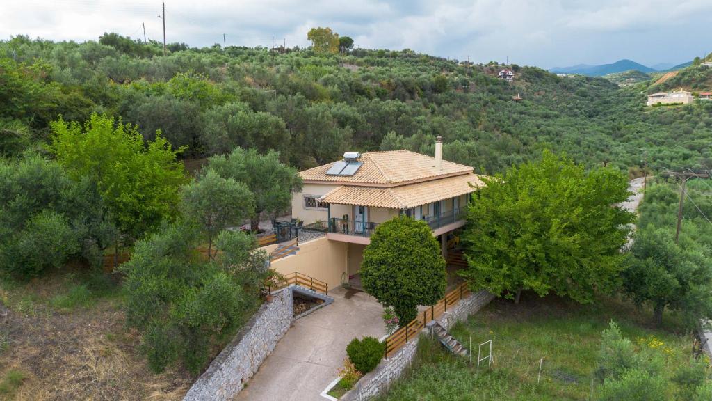 an aerial view of a house on a hill at Villa Olive in Kalamata