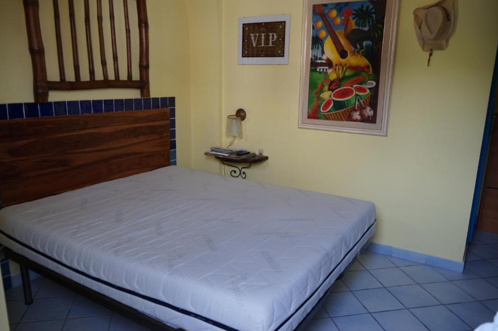 Postel nebo postele na pokoji v ubytování Casa Matarazzo