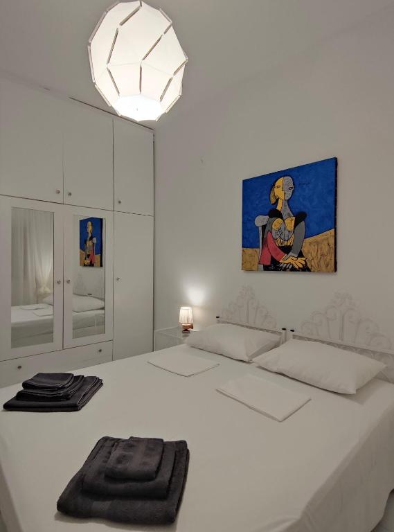 Postel nebo postele na pokoji v ubytování Cozy Seaview Apartment