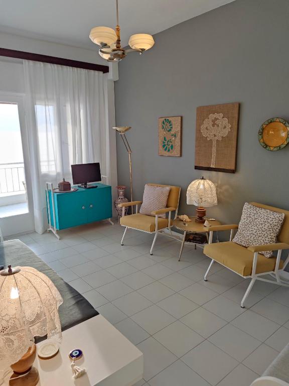 Posezení v ubytování Cozy Seaview Apartment