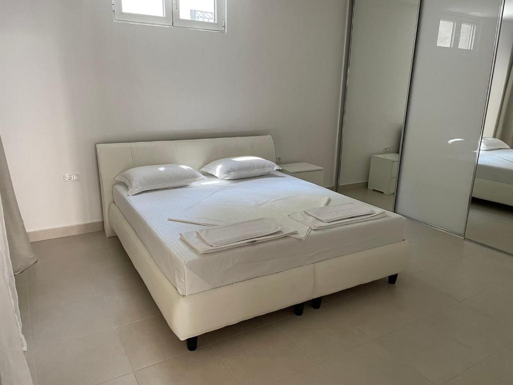 Postel nebo postele na pokoji v ubytování Vertmont Apartments