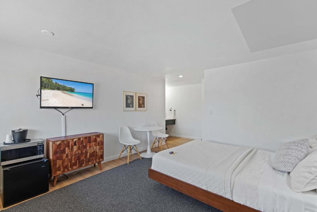 Postel nebo postele na pokoji v ubytování Cashmere Inn