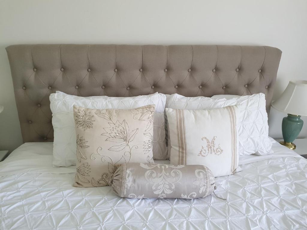 Postel nebo postele na pokoji v ubytování Rosebank Guesthouse
