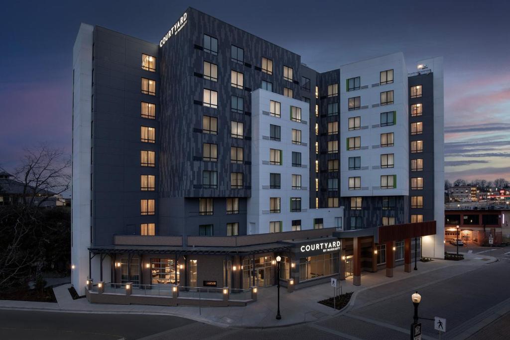 a rendering of a hotel with a building at Courtyard by Marriott Nanaimo in Nanaimo