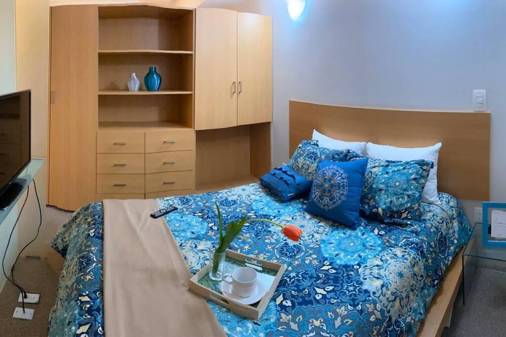 Voodi või voodid majutusasutuse Espectacular Suite PASEO DE LA REFORMA toas
