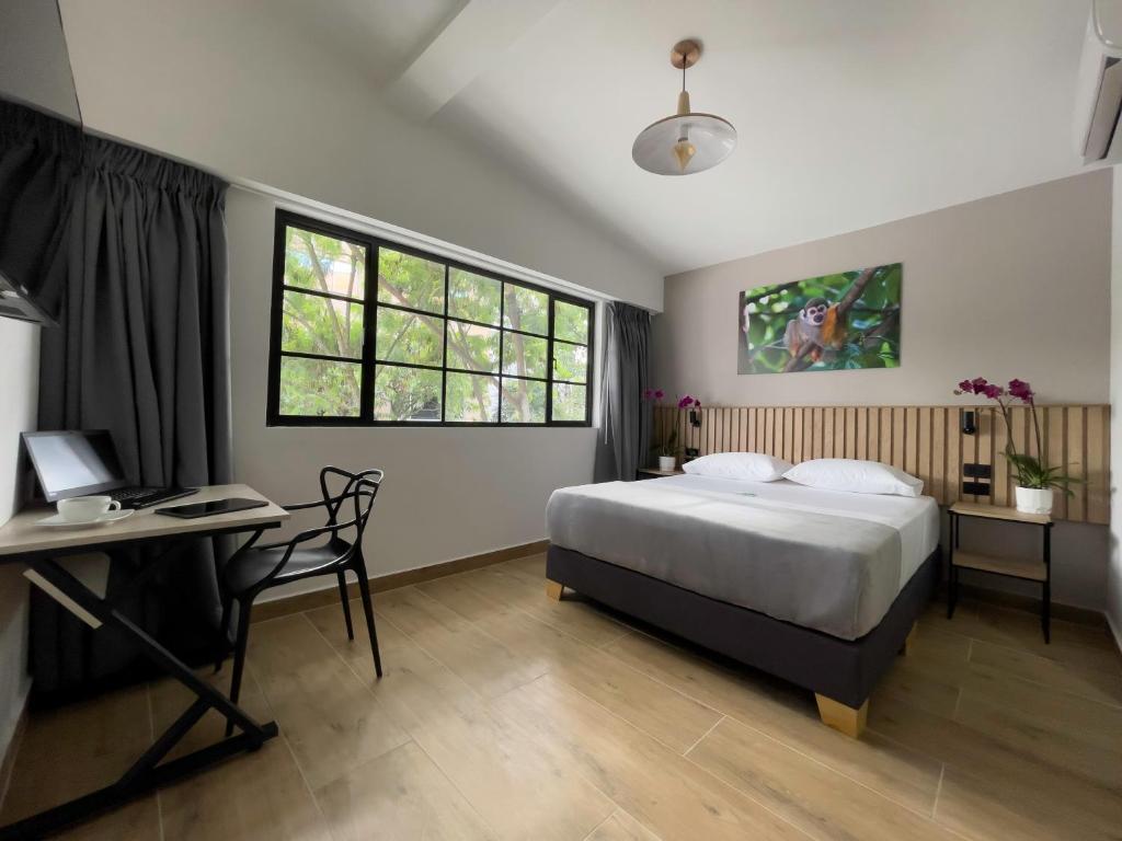 Postel nebo postele na pokoji v ubytování Vita Hotel Boutique
