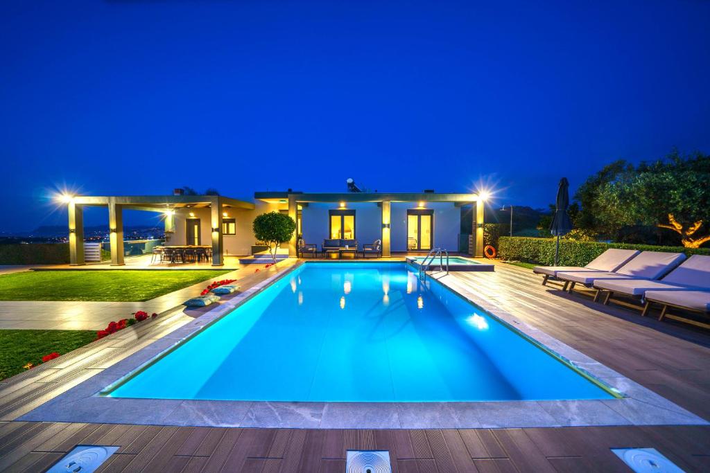 The swimming pool at or close to Mythic Olive villa - Heated Pool - Amazing view