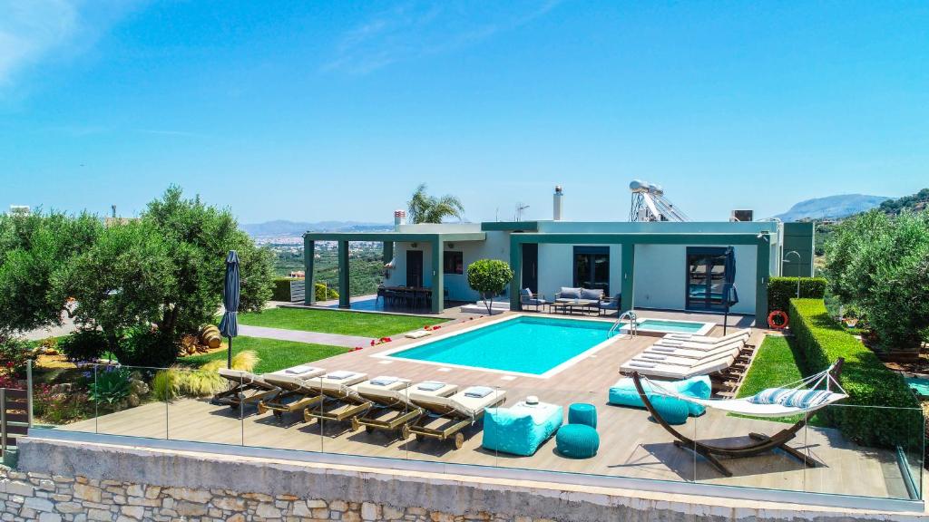 The swimming pool at or close to Mythic Olive villa - Heated Pool - Amazing view