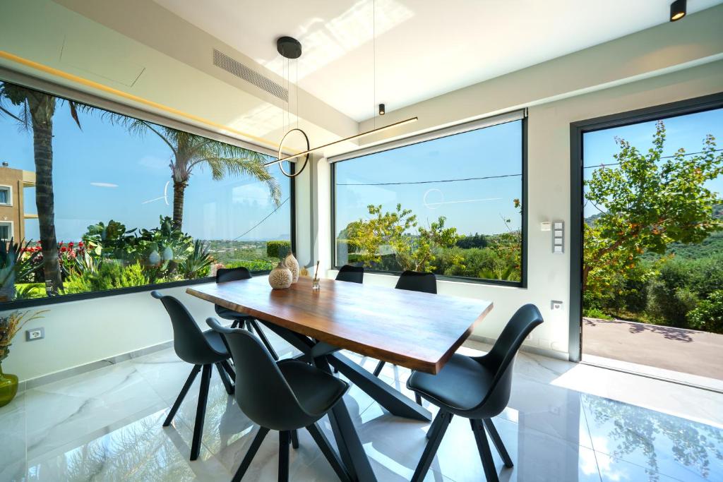 A balcony or terrace at Mythic Olive villa - Heated Pool - Amazing view