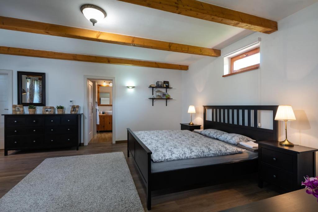 A bed or beds in a room at FARMAOBECKOV sk