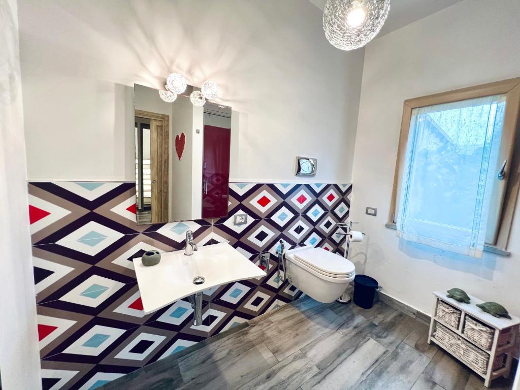 Postel nebo postele na pokoji v ubytování Casa di Ivana