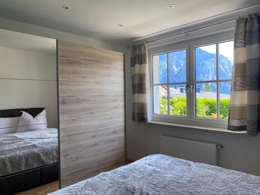 Postel nebo postele na pokoji v ubytování Luxury-Suites Traunsee