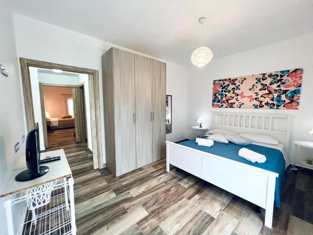 Postel nebo postele na pokoji v ubytování Casa di Ivana
