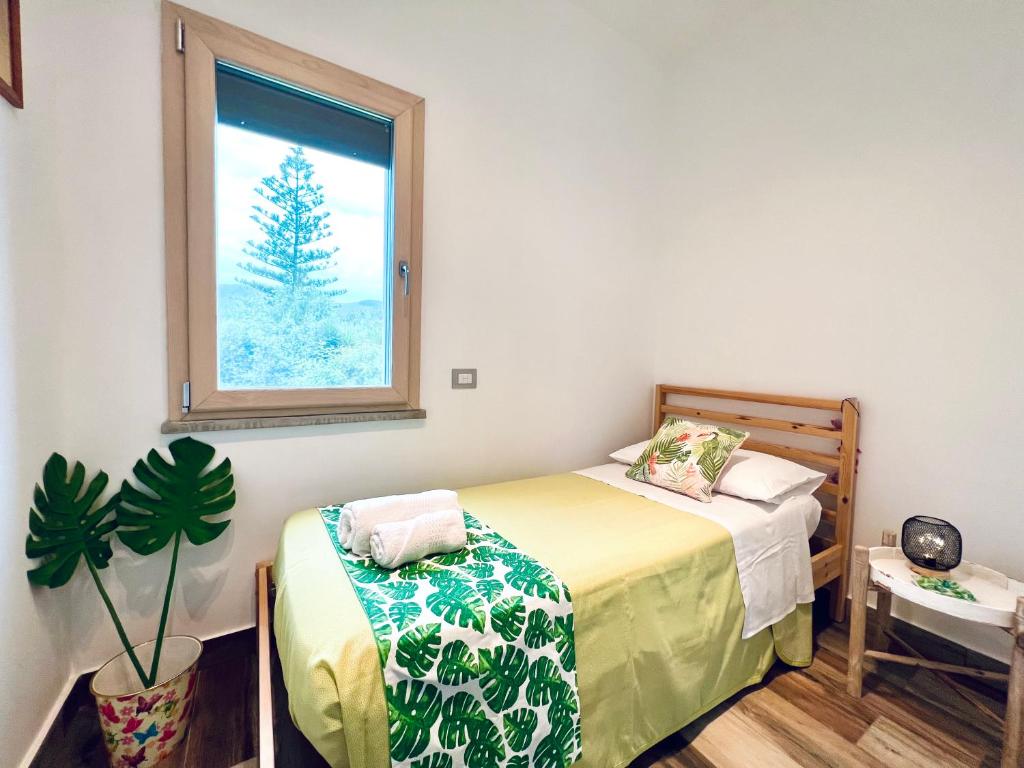 Postel nebo postele na pokoji v ubytování Casa di Ivana