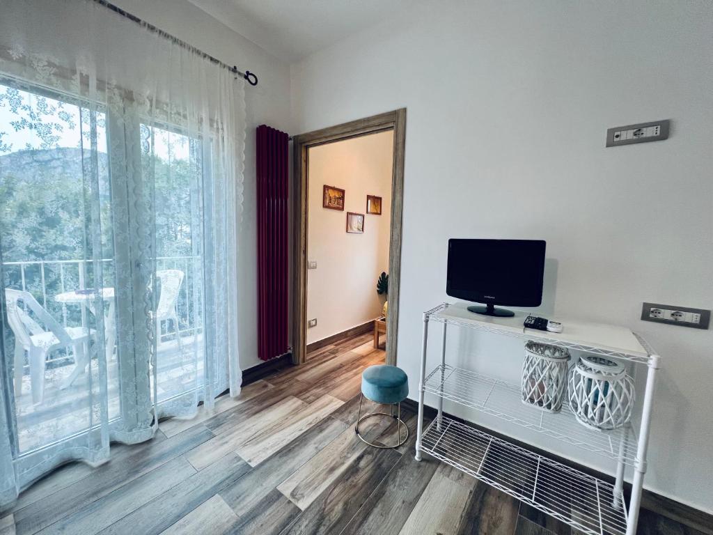 TV a/nebo společenská místnost v ubytování Casa di Ivana