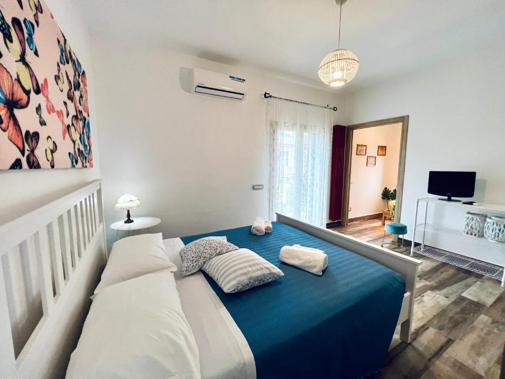 Postel nebo postele na pokoji v ubytování Casa di Ivana