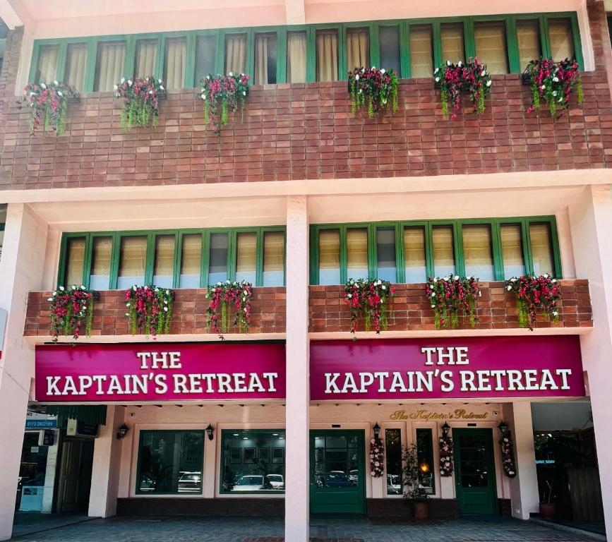 a building with a sign that reads the kryptonians retreat at The Kaptain's Retreat in Chandīgarh