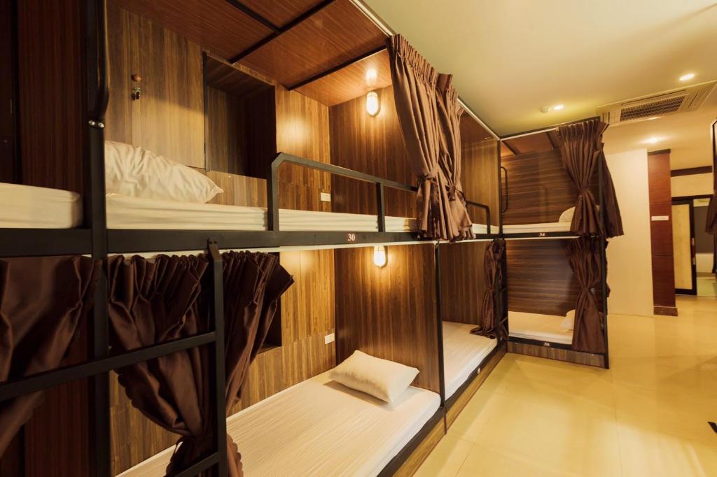 Postel nebo postele na pokoji v ubytování Brown Bean 2 Hotel