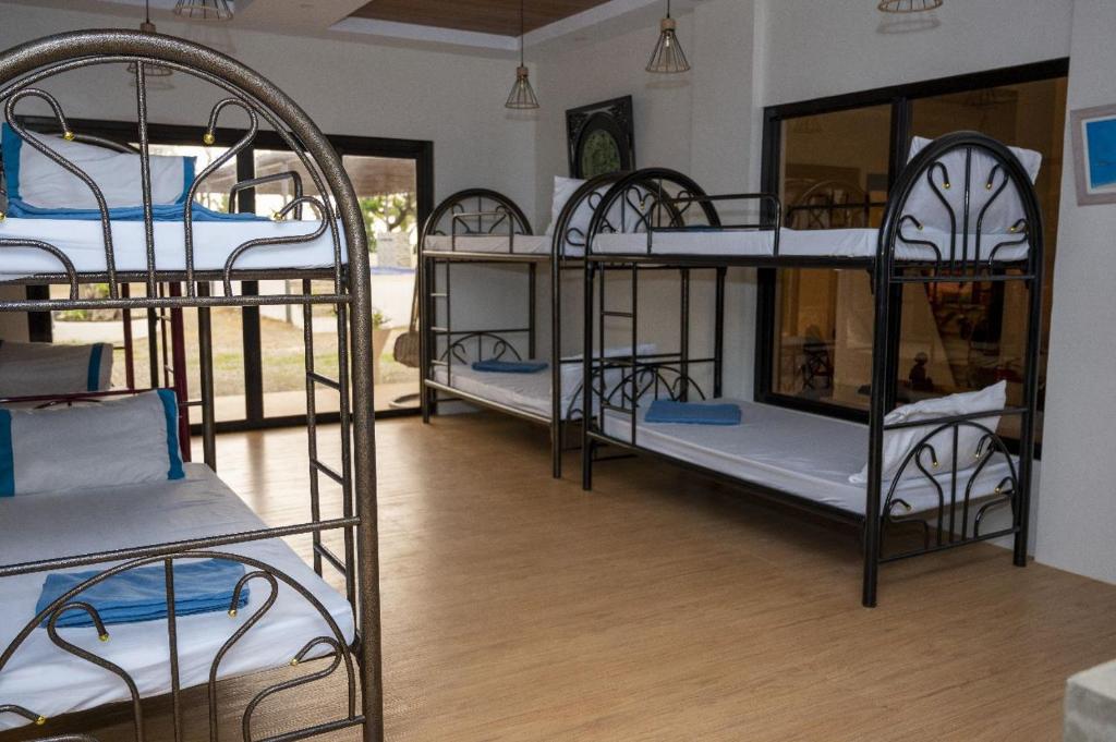 Postel nebo postele na pokoji v ubytování La Jose Beach Resort