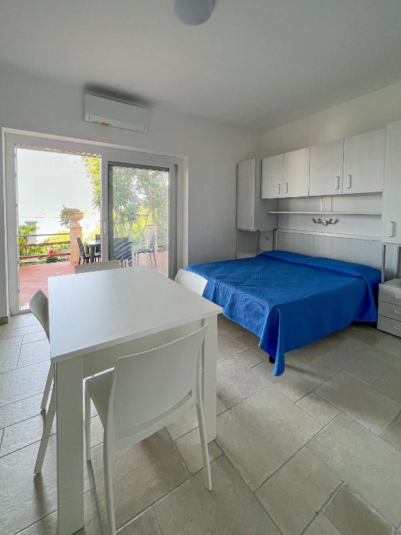 A kitchen or kitchenette at Appartamenti Serena
