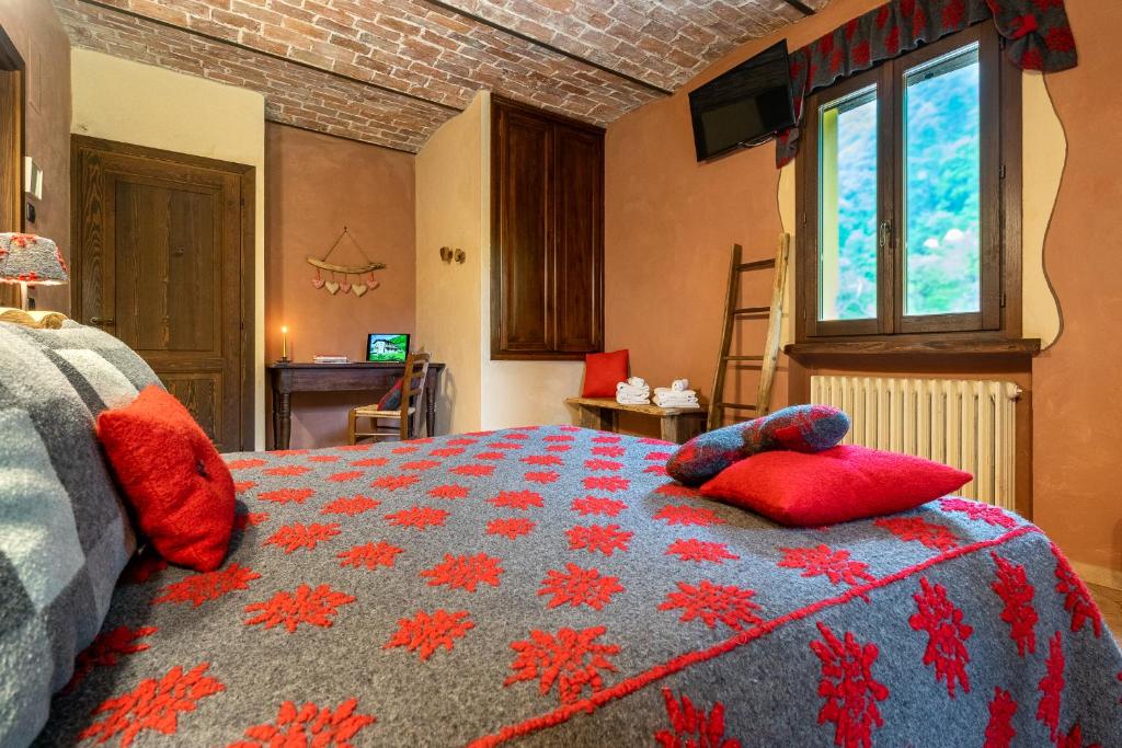 Postel nebo postele na pokoji v ubytování Cascina Veja