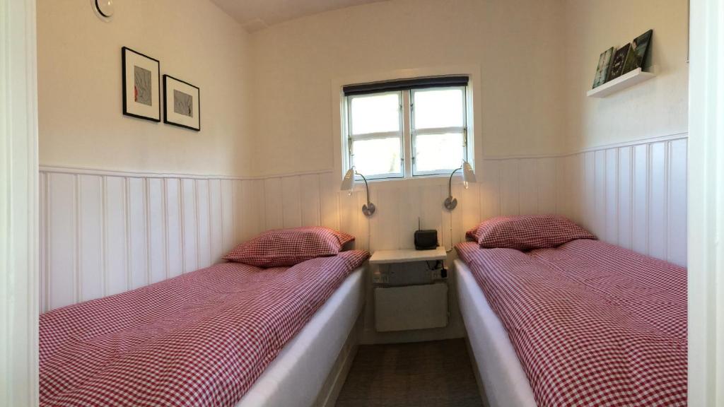 Letto o letti in una camera di Ølholm Cottage