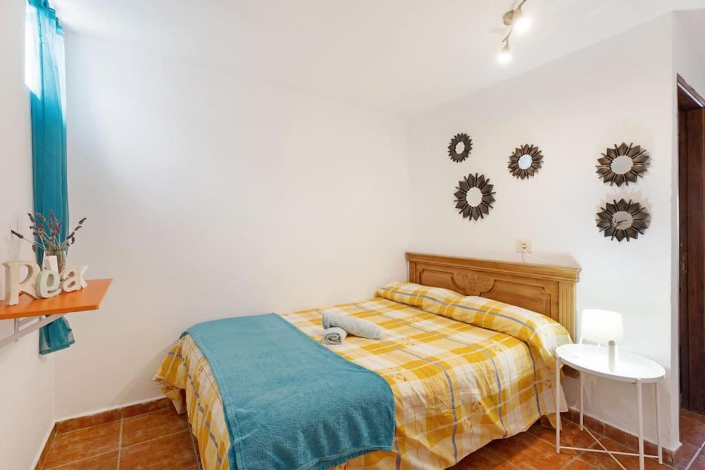 Posteľ alebo postele v izbe v ubytovaní Casa Punta del Sol Vista Al Atlántico