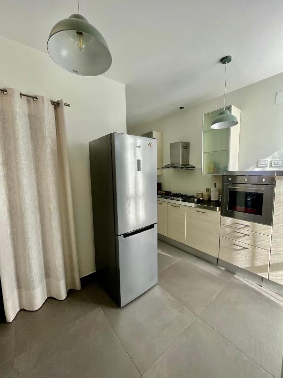 A kitchen or kitchenette at PRIVATEHOUSEINROME