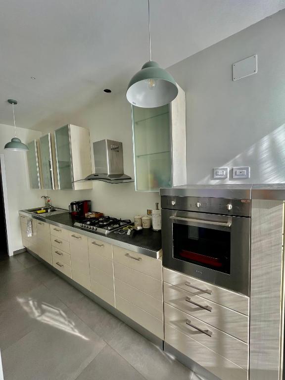 A kitchen or kitchenette at PRIVATEHOUSEINROME