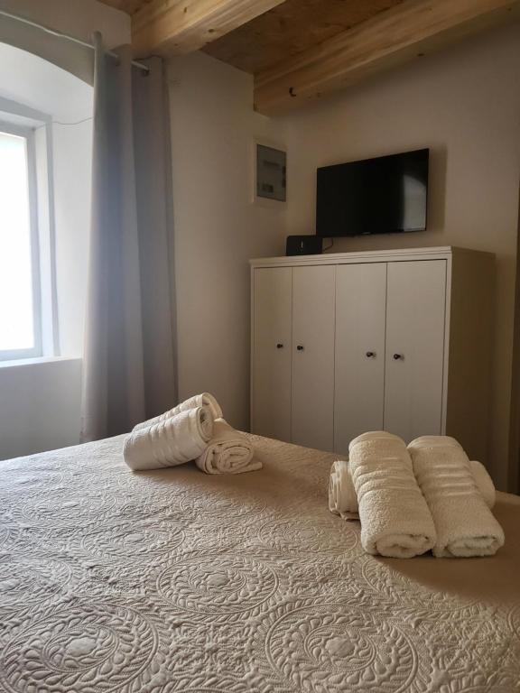 Postel nebo postele na pokoji v ubytování Pjaceta