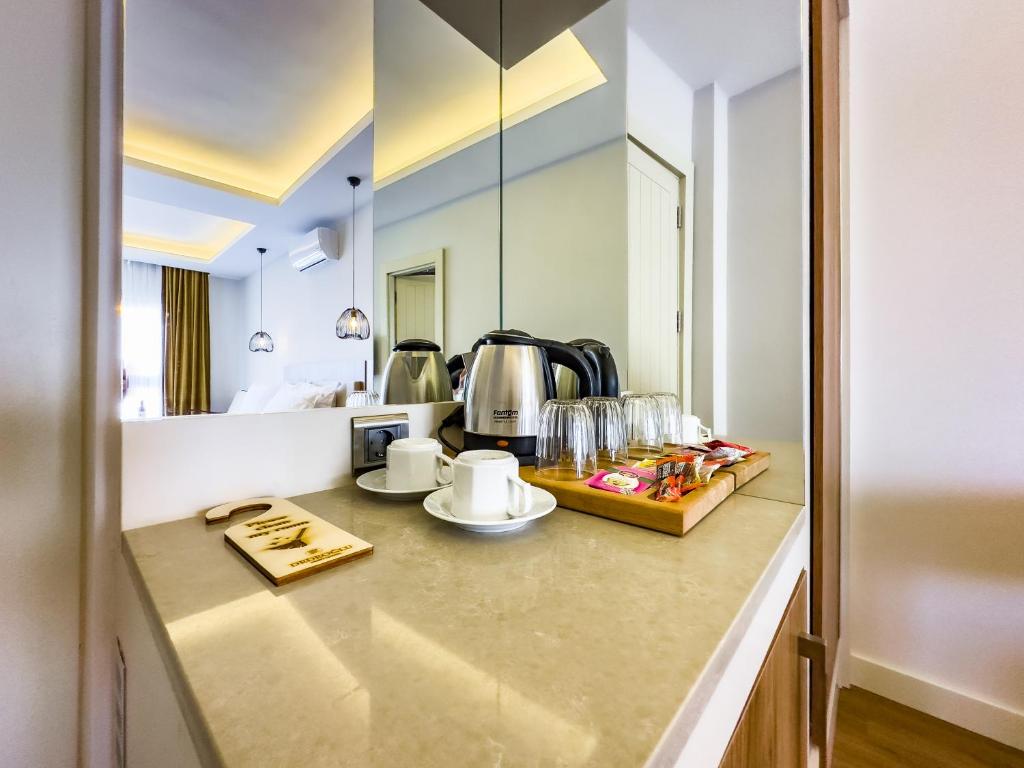 Kuchyň nebo kuchyňský kout v ubytování Dedeoğlu Port Hotel