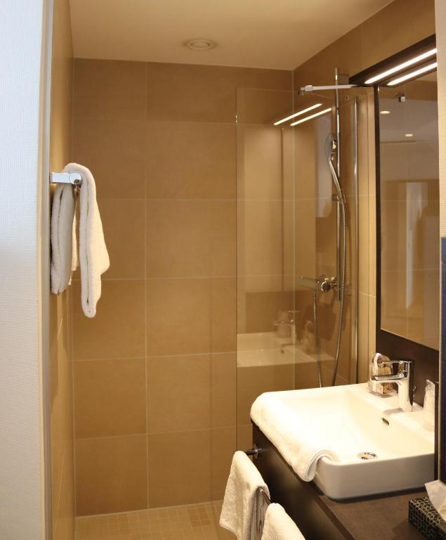 Koupelna v ubytování EINSTEIN Hotel am Römerpark