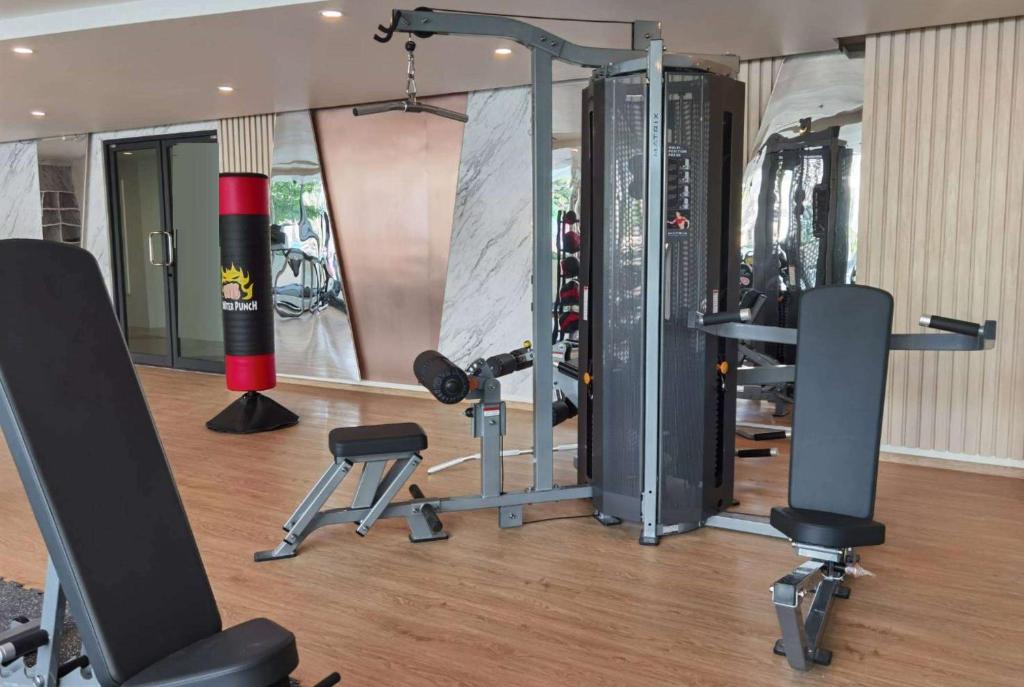 a gym with several equipment in a room at Wyndham La Vita Rawai Phuket in Rawai Beach