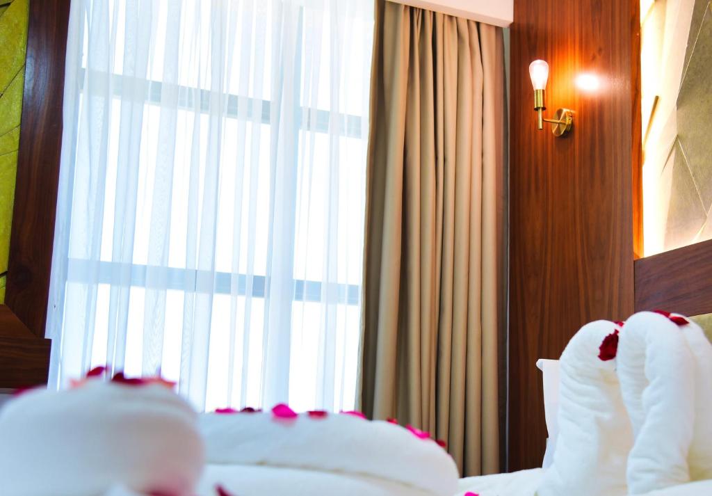 Ένα ή περισσότερα κρεβάτια σε δωμάτιο στο MIRANDA HOTEL - Tanger