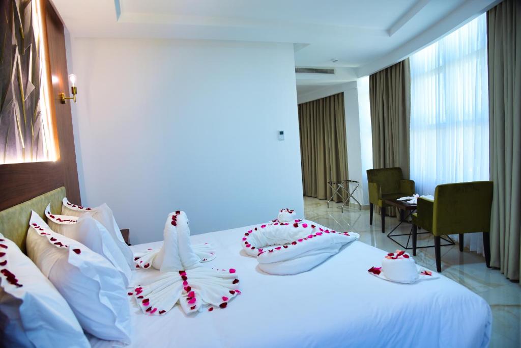 Ένα ή περισσότερα κρεβάτια σε δωμάτιο στο MIRANDA HOTEL - Tanger