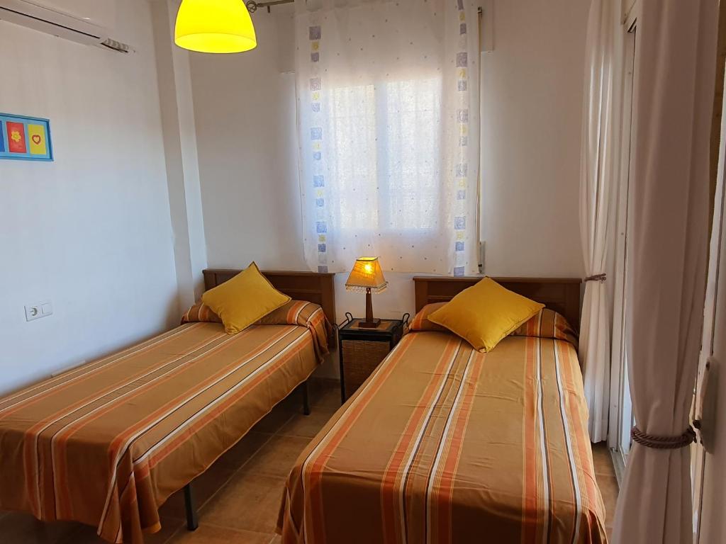 Postel nebo postele na pokoji v ubytování Luxurious Carabeo 2000 1.3