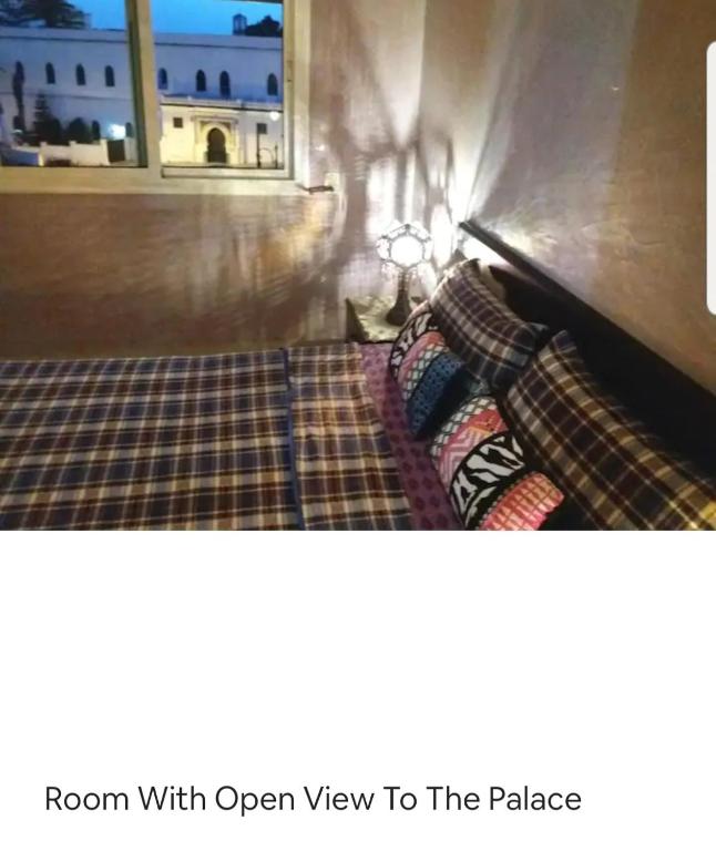 Postel nebo postele na pokoji v ubytování Æřțíšťîč Śpăčê ïń țhë čëňţřë