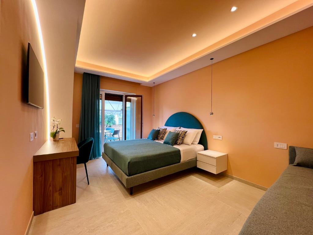 Postel nebo postele na pokoji v ubytování YourHome - Lucrezia Suites