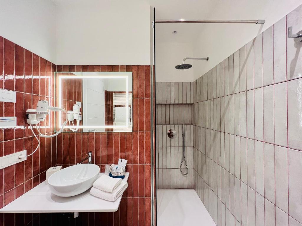 Koupelna v ubytování YourHome - Lucrezia Suites