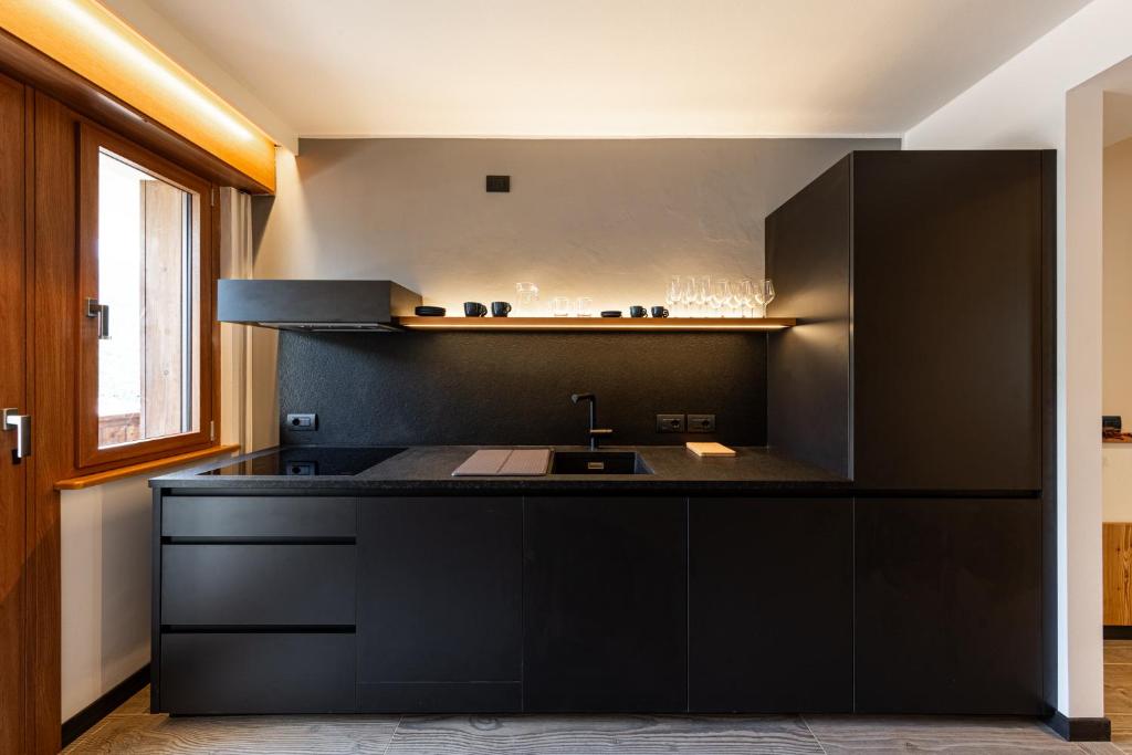 Kuchyň nebo kuchyňský kout v ubytování Belsit Apartments