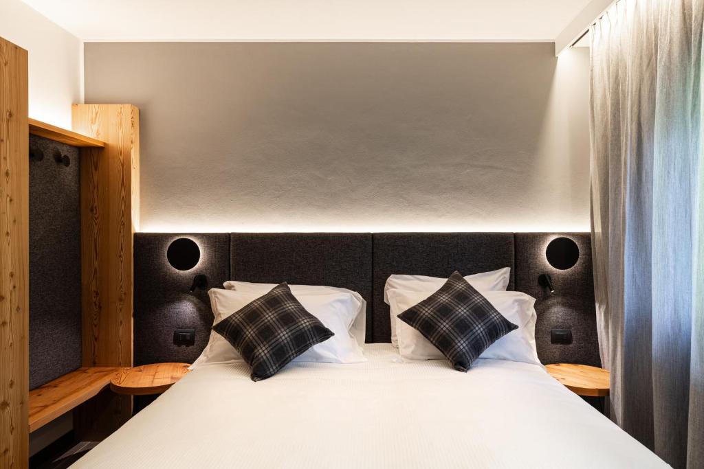 Postel nebo postele na pokoji v ubytování Belsit Apartments
