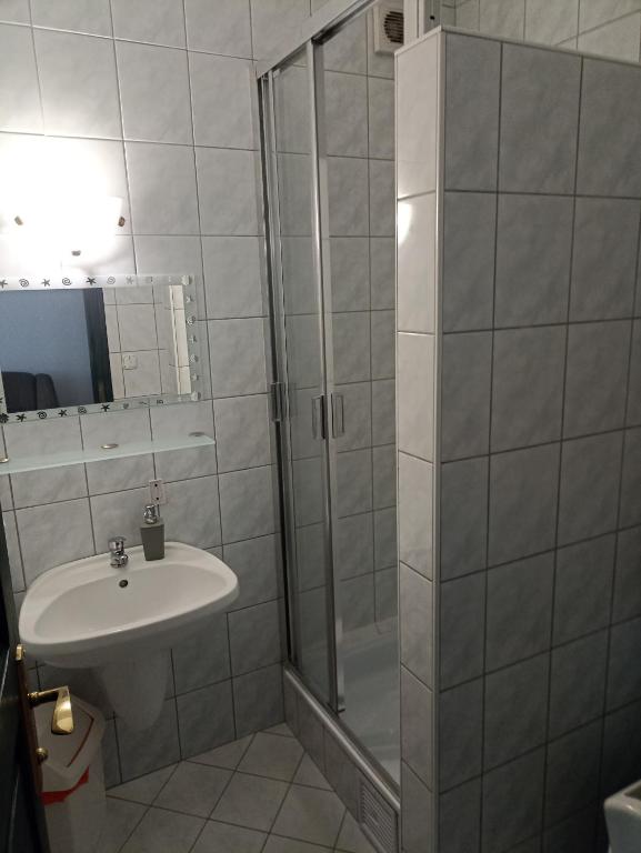 Koupelna v ubytování Muschel Panzió