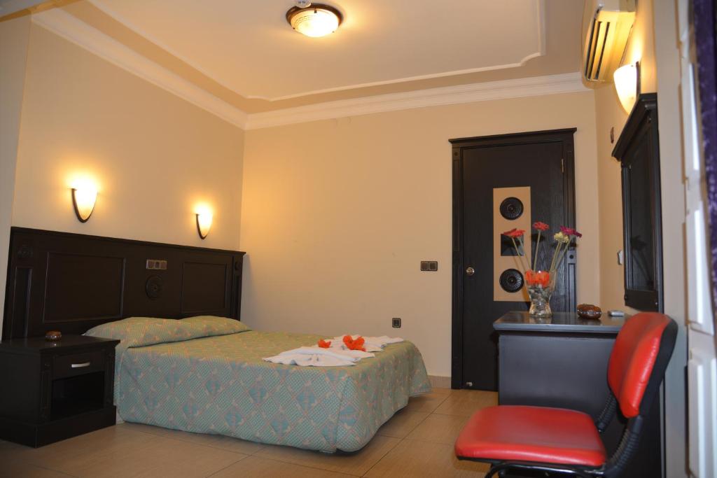 Postel nebo postele na pokoji v ubytování Fidan Apart Hotel