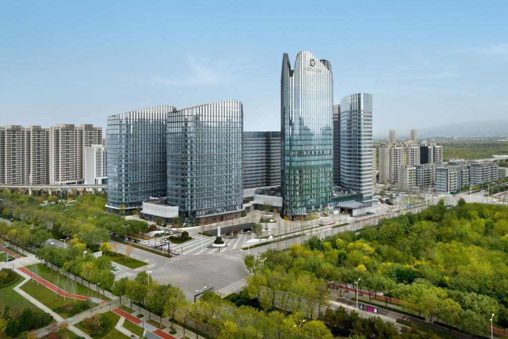 an aerial view of a city with tall buildings at Sheraton Xi'an Chanba in Xi'an