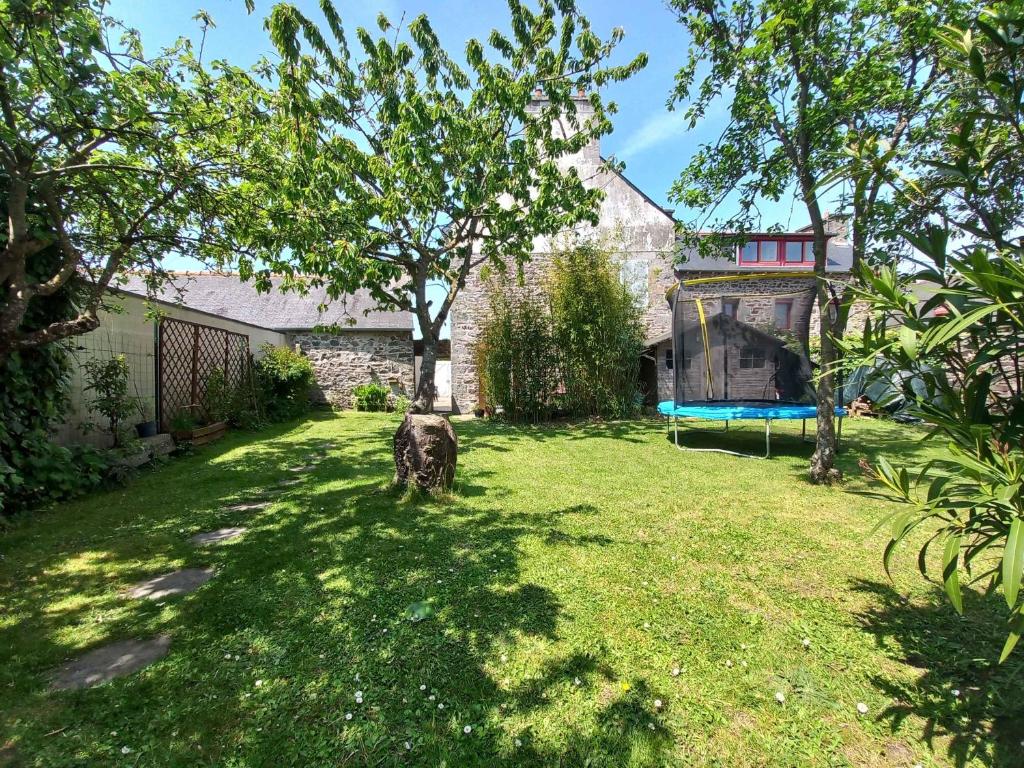 Vonkajšia záhrada v ubytovaní Gîte Les Cerisiers