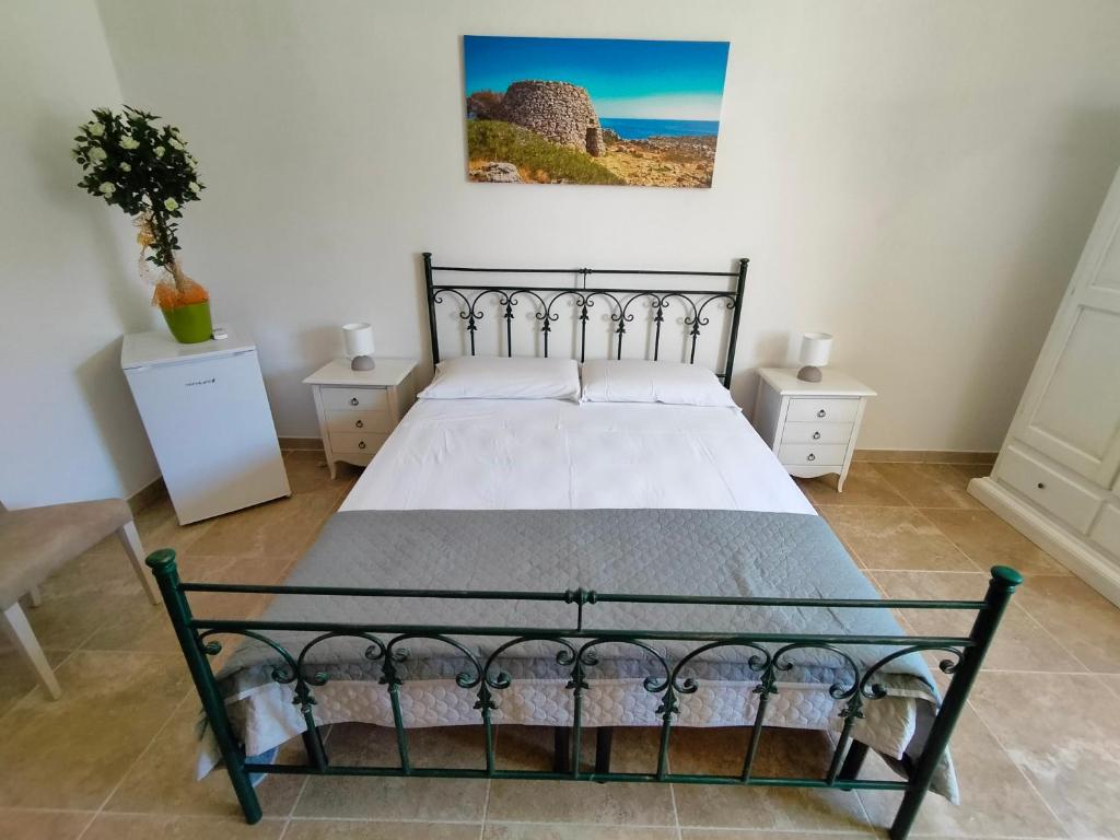 A bed or beds in a room at masseria Furca