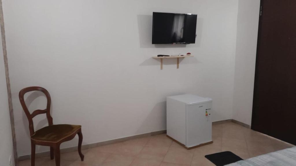 TV a/nebo společenská místnost v ubytování BeaStella Holiday Rooms