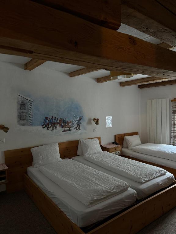 Postel nebo postele na pokoji v ubytování Hotel Acla Filli